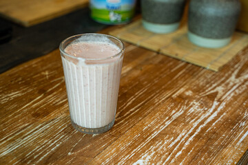 Delicious Pink Smoothie made from Milk and Yoghurt with foam on top