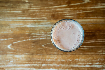 Delicious Pink Smoothie made from Milk and Yoghurt with foam on top