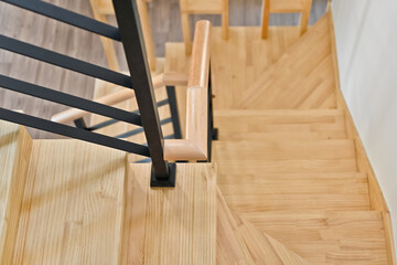 Light colored wooden colored stairs made from maple wood