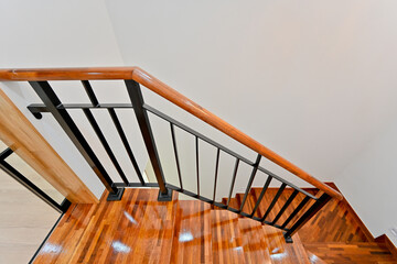 Light colored wooden colored stairs that go well with a modern home