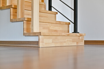Light colored wooden stairs made from maple wood