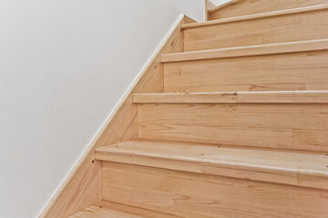 Maple is a popular light colored wood color for staircases
