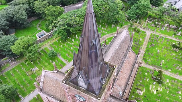 St. Magnus Cathedral, Kirkwall, Scotland UK. Birds Eye Aerial of Landmark Tower, Roof and Cemetery