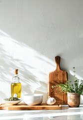 Sunlit Kitchen Counter With Olive Oil, Fresh Herbs, and Cooking Utensils in the Morning
