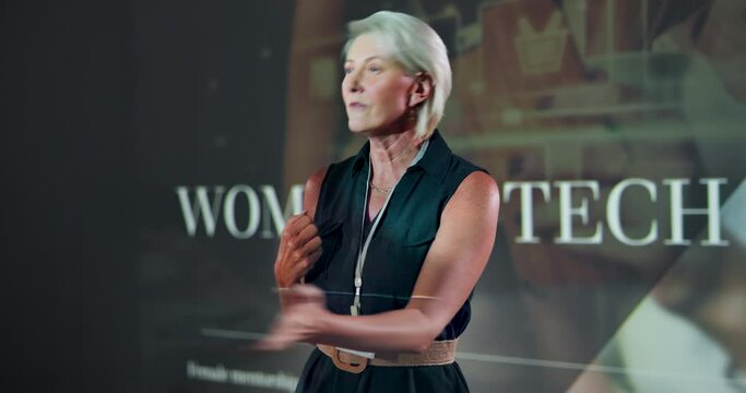 CEO, speaker and business woman at conference for tech, seminar and workshop for motivation. Presentation, talking and professional at event for training, coaching or mature programmer in auditorium