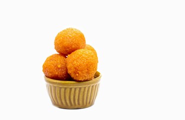 Indian Sweet Motichoor Laddu or Motichur Ladoo in a Bowl Isolated on White Background with Copy Space, Also Known as Bundi Ladoo