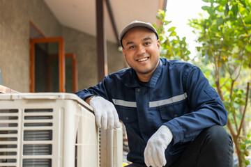 Air conditioner service outdoor checking fix repair. Air conditioner cleaning technician He opened...