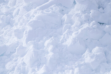 Background of pattern fresh white snow texture. Bright winter backdrop white empty snowy field...