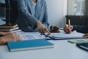 Businessman and lawyer discuss the contract document. Treaty of the law. Sign a contract business.