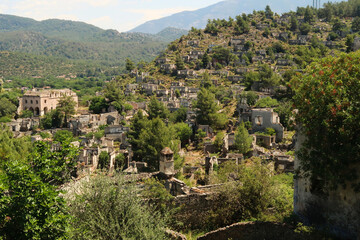 View between the houses on the abandoned village of Kayaköy, Livissi, close to Fethiye, Turkey