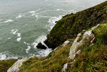 Howth Cliffs, Dublin, Ireland. Cloudy landscape with Ireland coastline and North Sea. Howth Cliffs Walk.