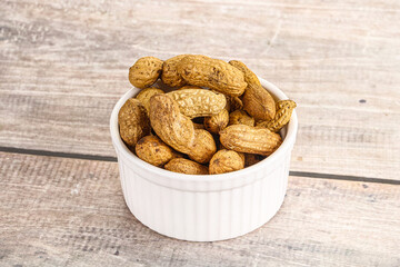Raw ripe unpeeled peanut heap