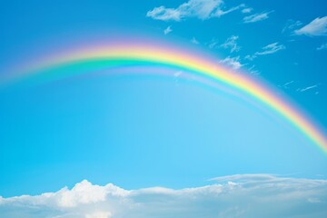 Rainbow in Blue Sky With Clouds