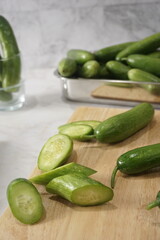 cut mini cucumber on a plate that's easy to eat