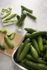 cut mini cucumber on a plate that's easy to eat