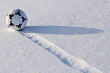 soccer ball on a snowy field