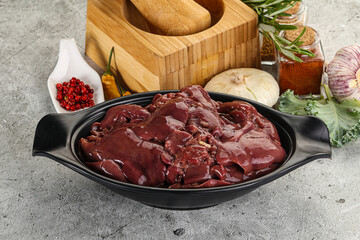 Raw uncooked chicken liver in the bowl