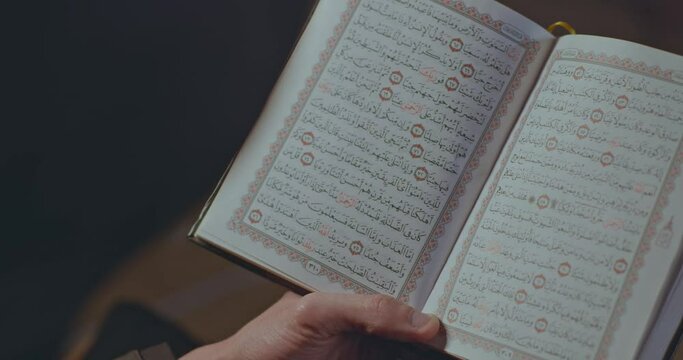 close up on the holy Quran page's 
