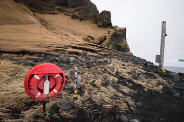 red lifebuoy with rope and rescue kit, reynisfjara beach, iceland, emergency kit, case of an emergency, 