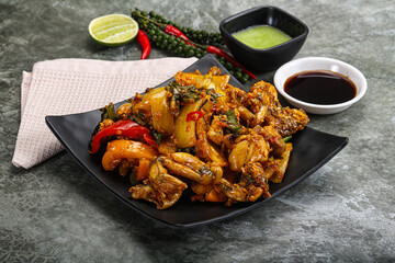 Vietnamese cuisine - fried frog with vegetables