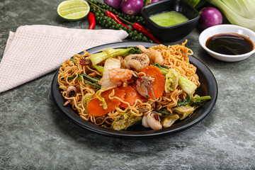 Asian cuisine - Fried noodles with seafood