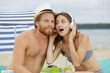 summer holidays vacation love and technology concept - obrazy, fototapety, plakaty