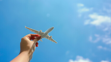 Concept of travel, Study abroad and freedom with a plane against a summer sky.