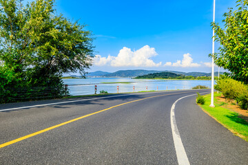 Asphalt highway road and beautiful coastline nature landscape in summer