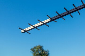 Aerial TV Antenna with clear blue sky