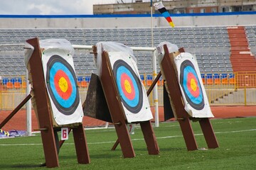 Colored Archery Target on stadium field