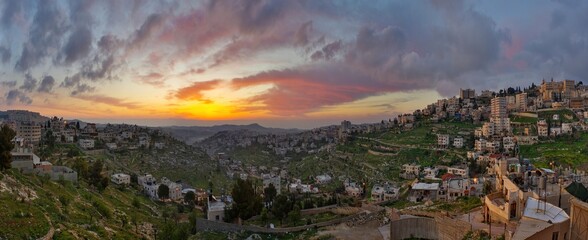 Sunrise in Israel and Palestine, a peaceful landscape at dawn. night lights in old historical biblical city Bethlehem in palestine region in Israel. Bethlehem city at the morning.