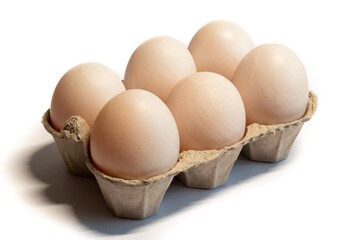 Eggs in carton isolated on white