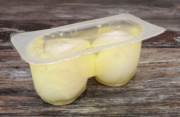 Pre cooked microwavable poached eggs pack containing two microwave poached eggs in brine