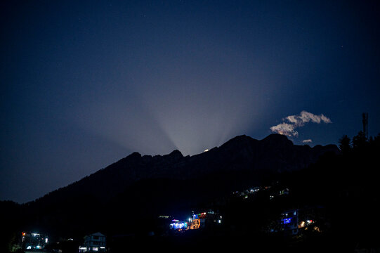 Moon rise behind the mountains