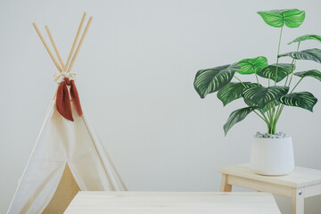 camping table with camp and tropical tree and white background