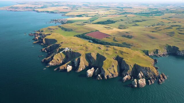Scotland From The Air: St Abbs Head and Its Iconic Lighthouse on Dramatic Cliffs, United Kingdom.
