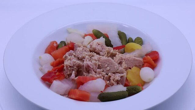 Mediterranean tuna salad. Vegetables summer salad with tuna.