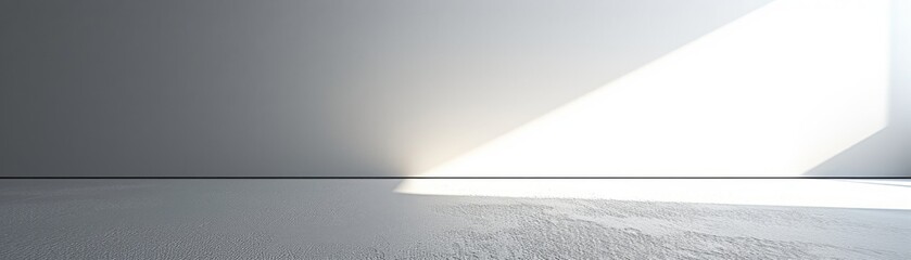Minimalist white wall with textured plaster and sharp light shadow
