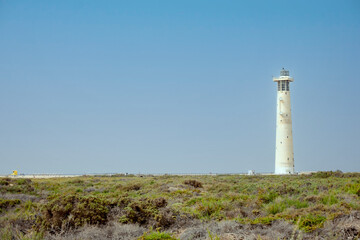 Fototapeta na wymiar Morro Jable lighthouse on the island of Fuerteventura in the Canary Islands