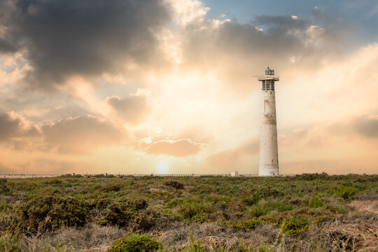 Morro Jable lighthouse on the island of Fuerteventura in the Canary Islands at sunset