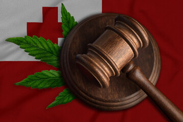 Gavel on the Tonga flag background. Medical cannabis concept