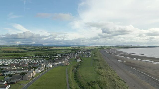 Aerial of a small coastal town - Allonby, UK