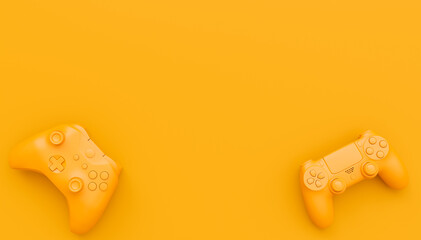 Video game joysticks or gamepads in plain monochrome yellow color background © Vasyl Onyskiv
