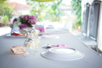 Beautiful flowers decorated on the table. Tables set for an event party or wedding reception. Fancy moment fancy time.
