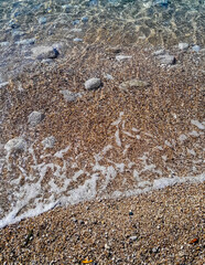 Beach. Crystal clear sea water and sand.