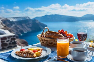 A luxurious breakfast with orange juice, coffee and pastries on an outdoor table overlooking the sea