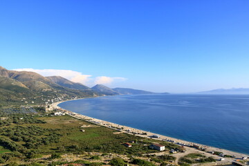 Aerial view of Borshit beach. Qazim Pali cityscape. Colorful seascape of Adriatic sea, Albania