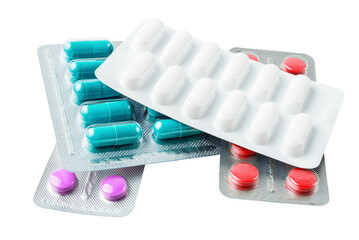 Various medicine capsules, pills and tablets in a blister pack isolated on white background,...