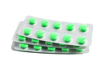 Green medicine pills in a blister pack isolated on white background, healthcare and medicine concept