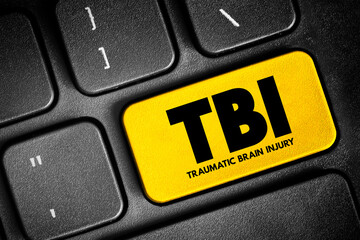 TBI Traumatic Brain Injury - intracranial injury to the brain caused by an external force, acronym text concept button on keyboard